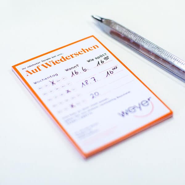 Terminzettelblock und Stift